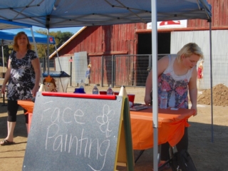 Setting up for face painting.