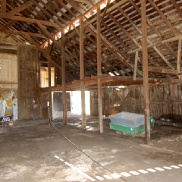 barn,roof,metal,cleaned,dirt,hose,people