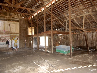 barn,roof,metal,cleaned,dirt,hose,people