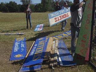 sign,pile,blue,tickets,event,festival,people
