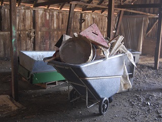 wheelbarrow,junk,wood,plastic,metal